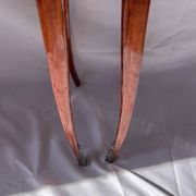 Pair of French rosewood bedside tables, marble top, inlaid beds.