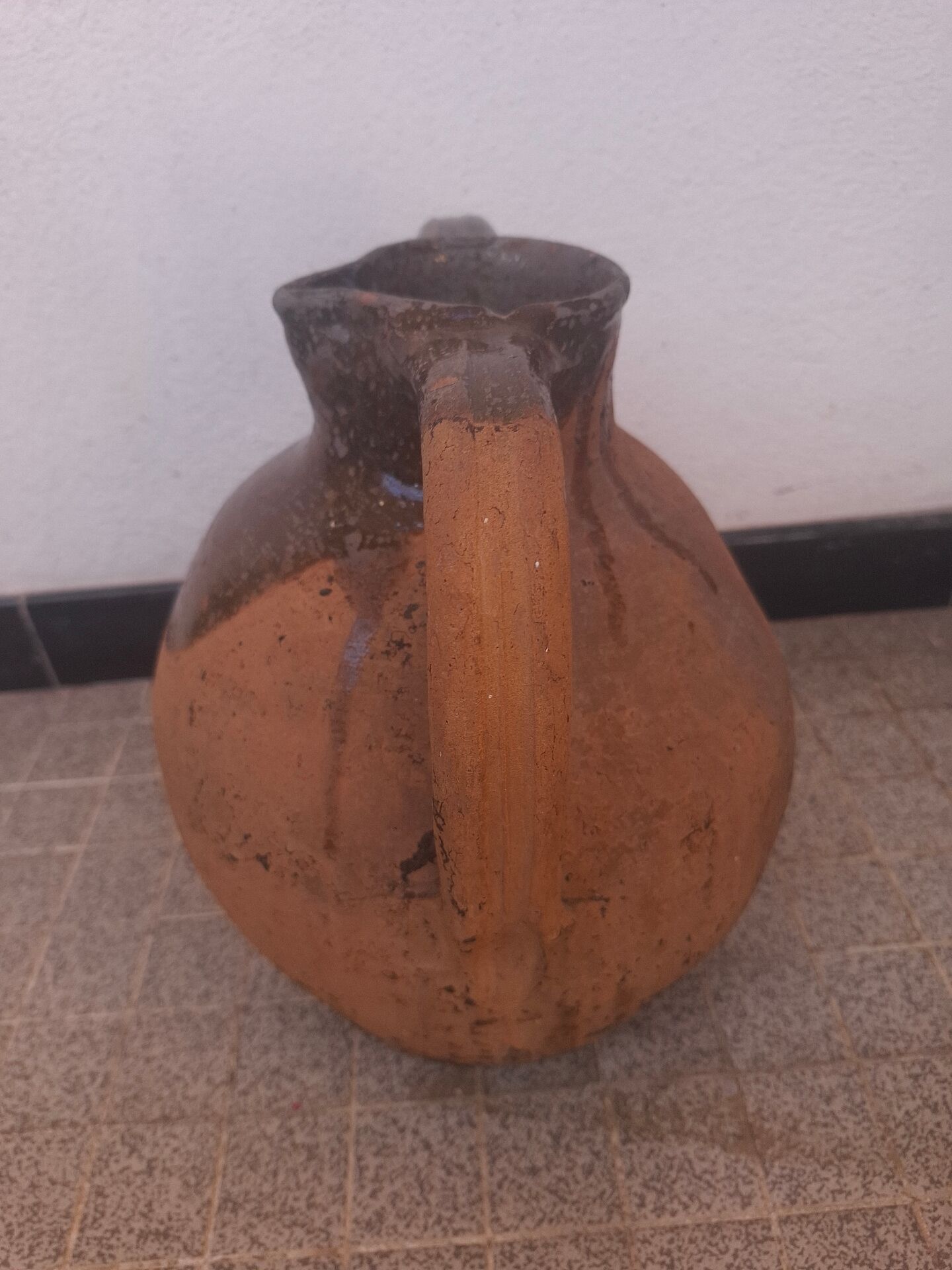 Jug, I stop at glazed terracotta oil.