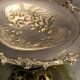 Cut basket basket handle on pedestal in silver metal with floral decoration