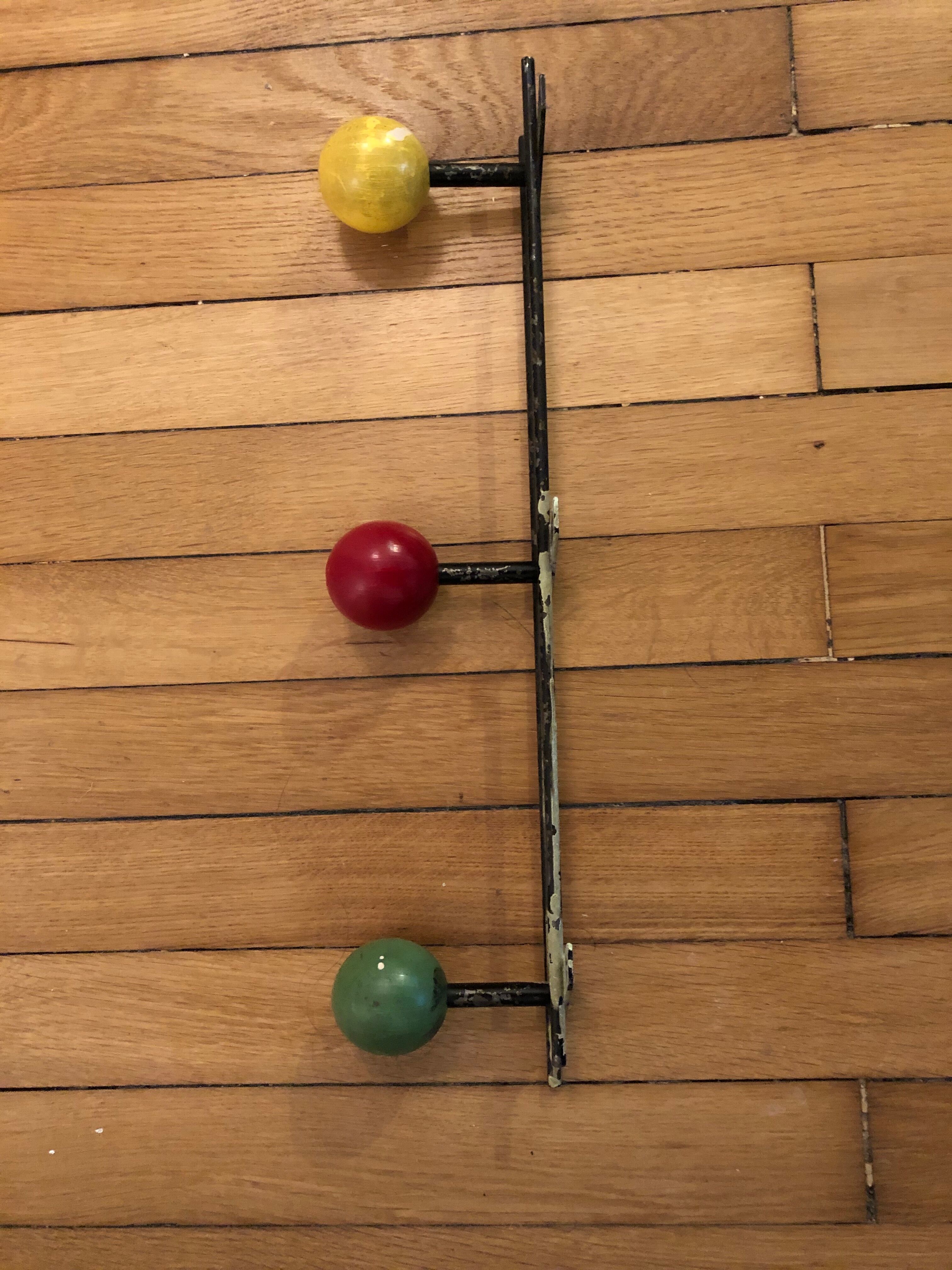 Vintage ball coat rack