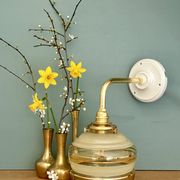 Applique coudée globe vintage en verre jaune et doré