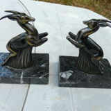 Pair of greenhouse book antelope in regulation on marble base