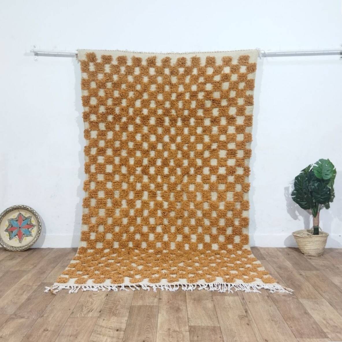 Moroccan Berber rug in ecru and camel wool with a graphic pattern, 245x150 cm.