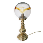 Table lamp in solid brass with a vintage 1970s glass globe.