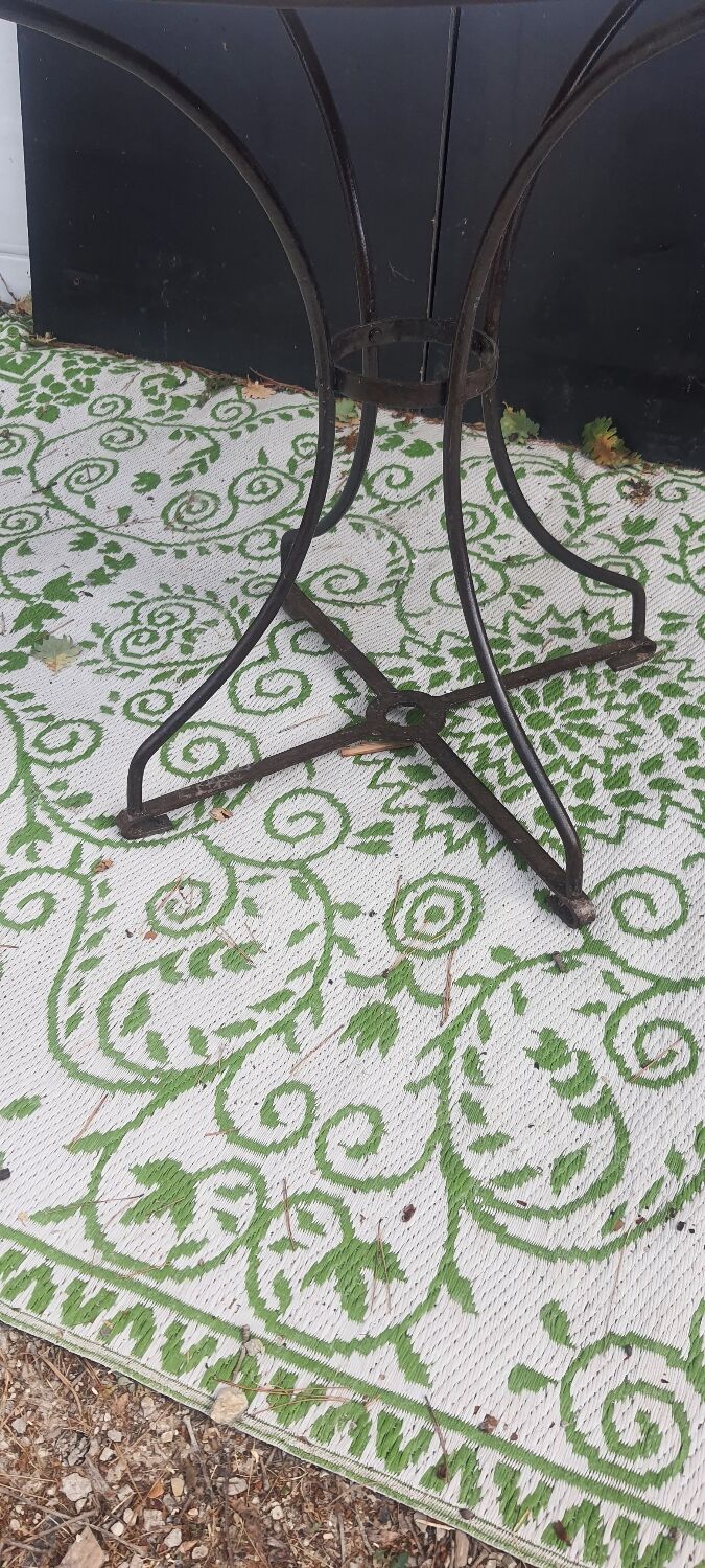 Wrought iron pedestal table