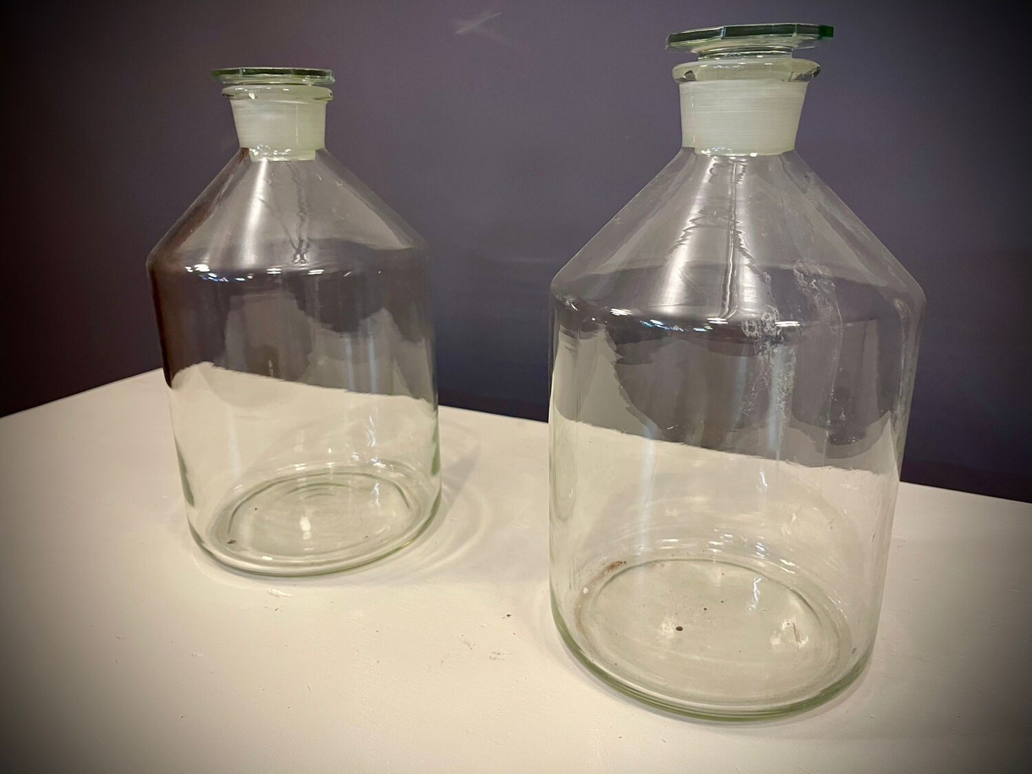 Pair of old factory perfume bottles