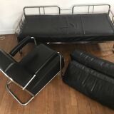 Sofa and armchair in chrome metal and black leather