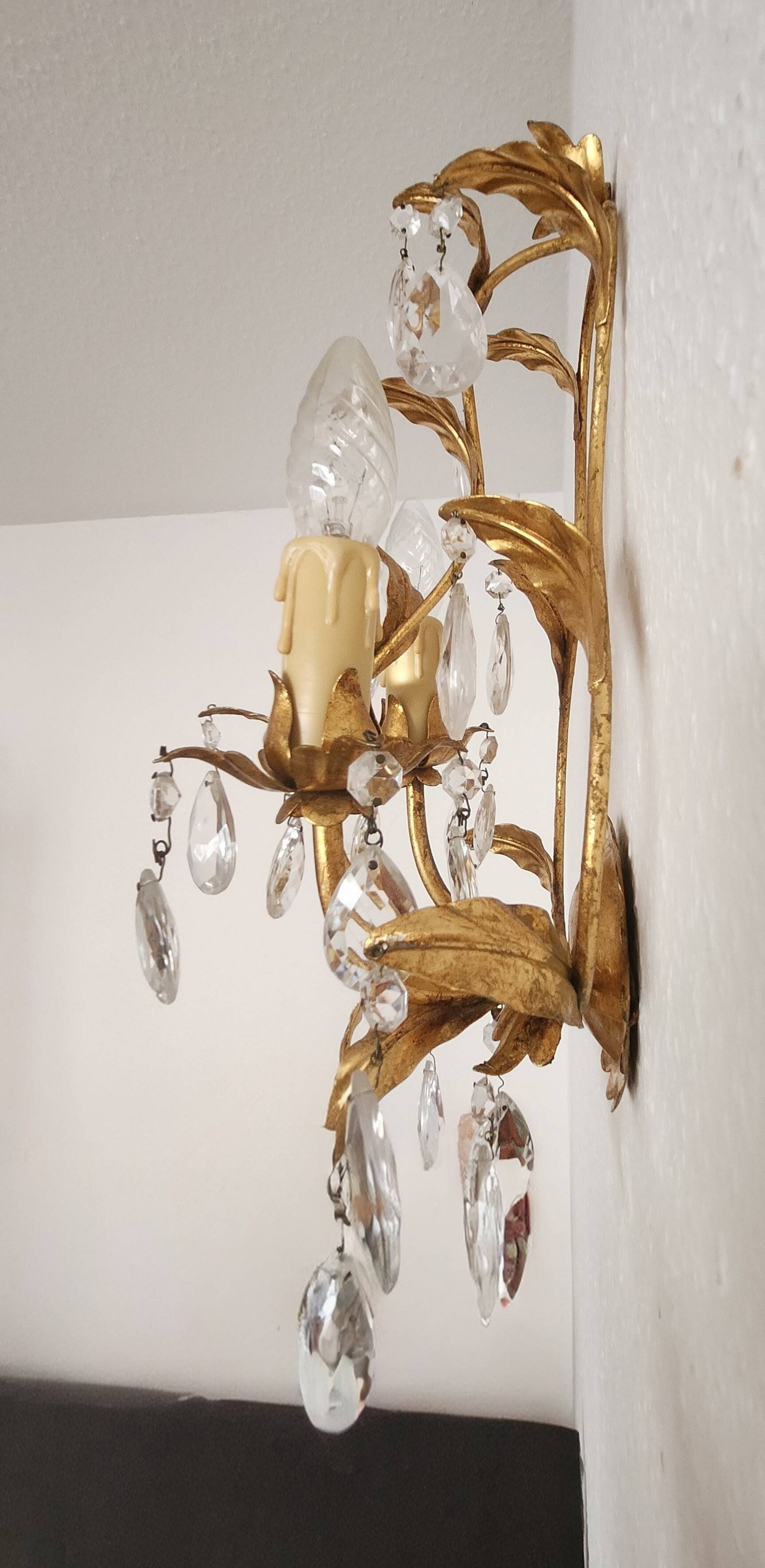 Hand-forged wall lamp gilded with gold leaf and crystals, Italy
