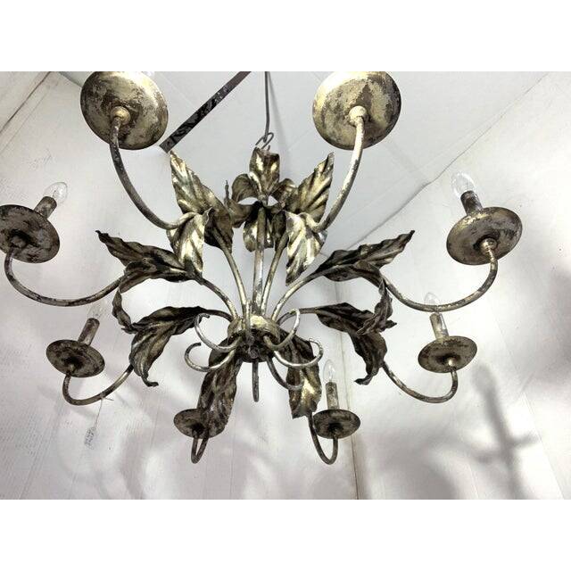 Contemporary brunish-silver florentine wrought iron chandelier