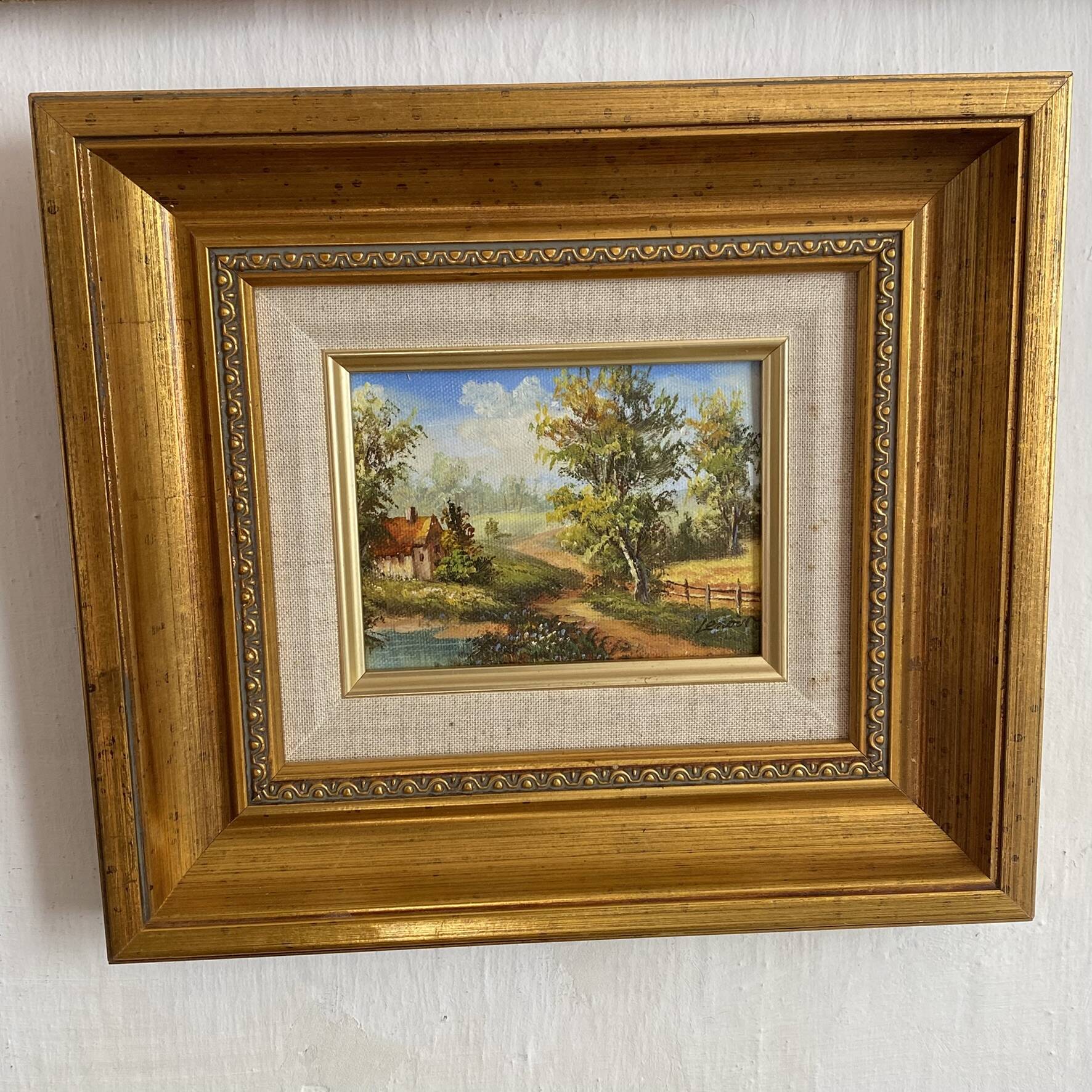 Small framed landscape painting