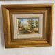 Small framed landscape painting