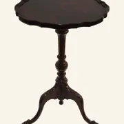 African mahogany guéridon, turned with a sculpted tripod leg.