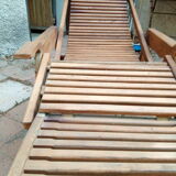 Teak stretchy long chair.