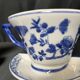 Set of white and blue porcelain flower cups from the early 20th century