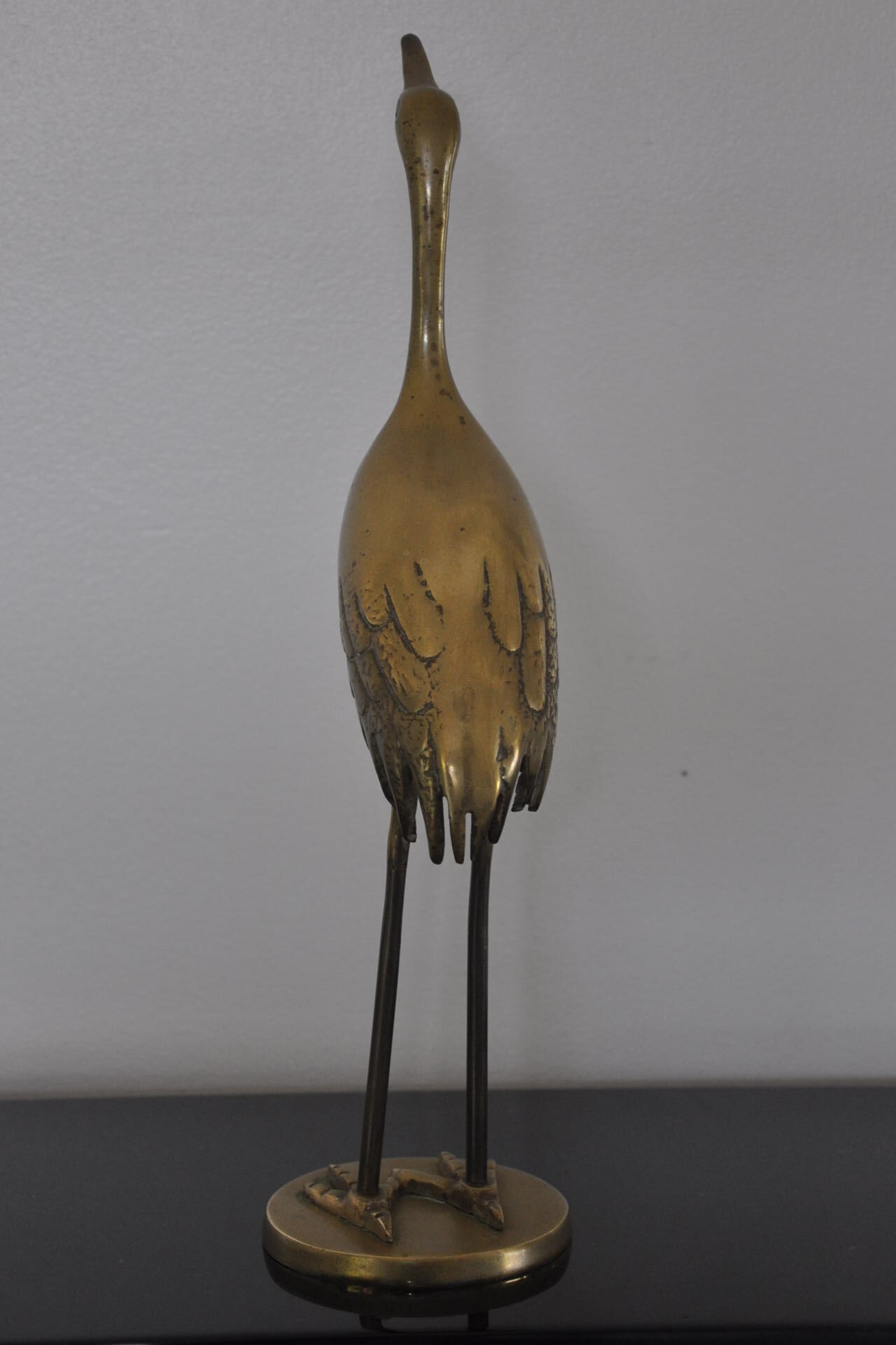 Vintage bronze statue wader