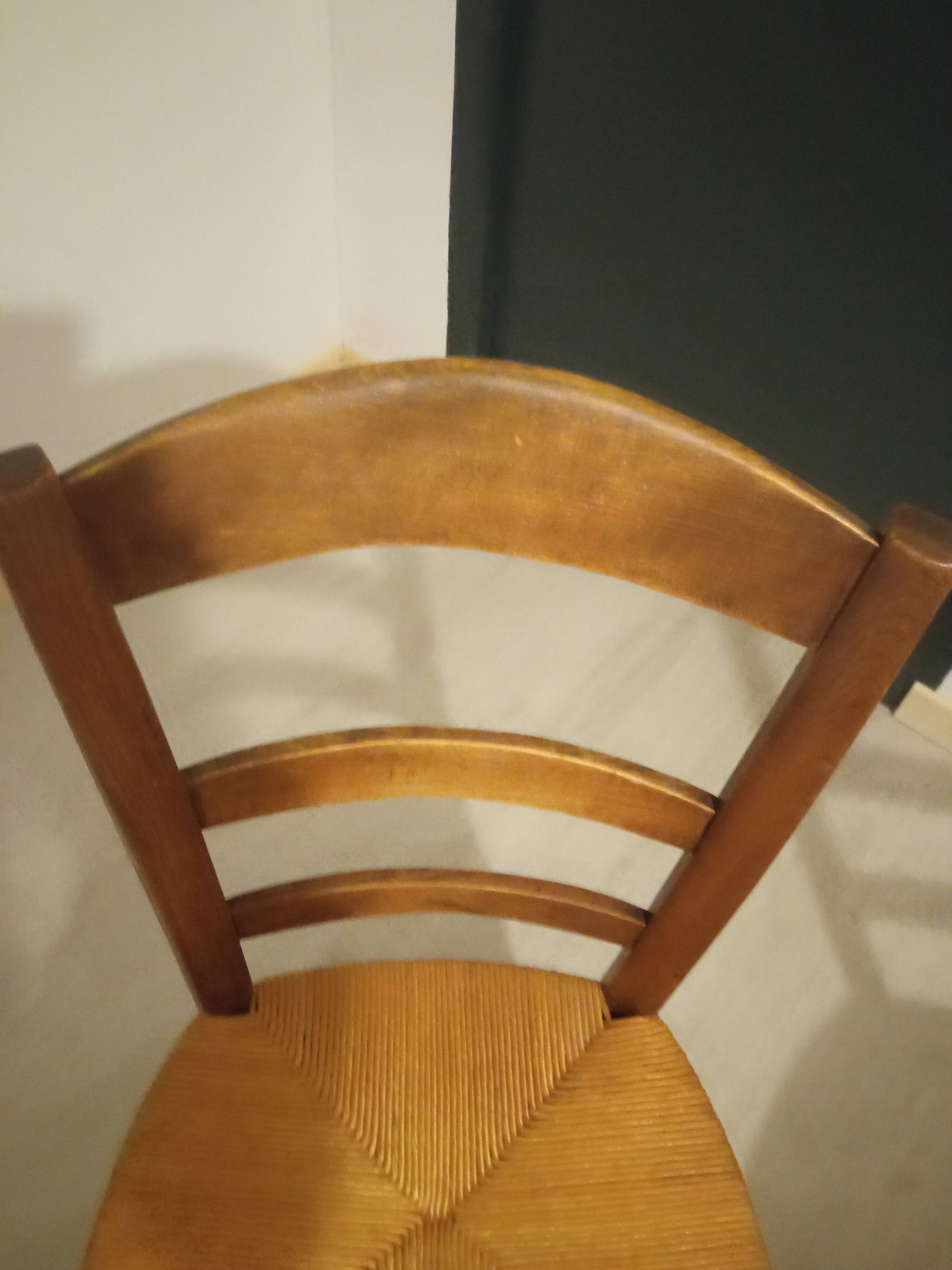 Pair of vintage wooden and woven straw chairs