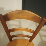 Pair of vintage wooden and woven straw chairs