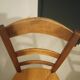 Pair of vintage wooden and woven straw chairs