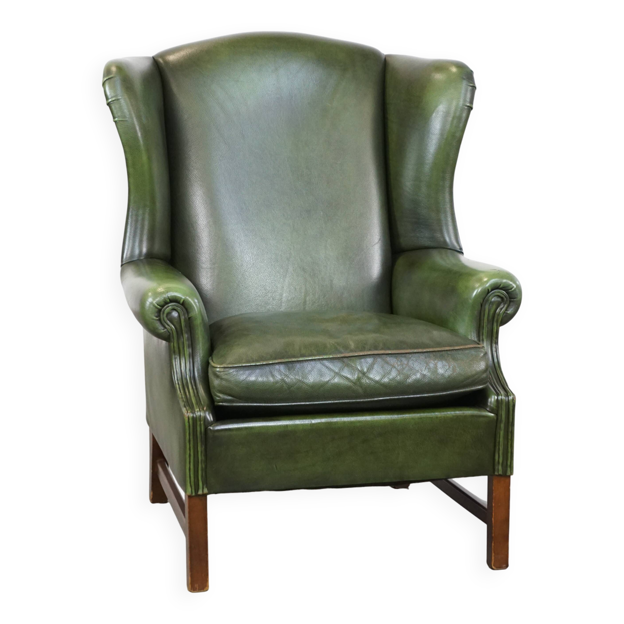 Fauteuil à oreilles Chesterfield anglais en cuir de vache vert avec une assise confortable