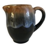 Small pitcher of milk
