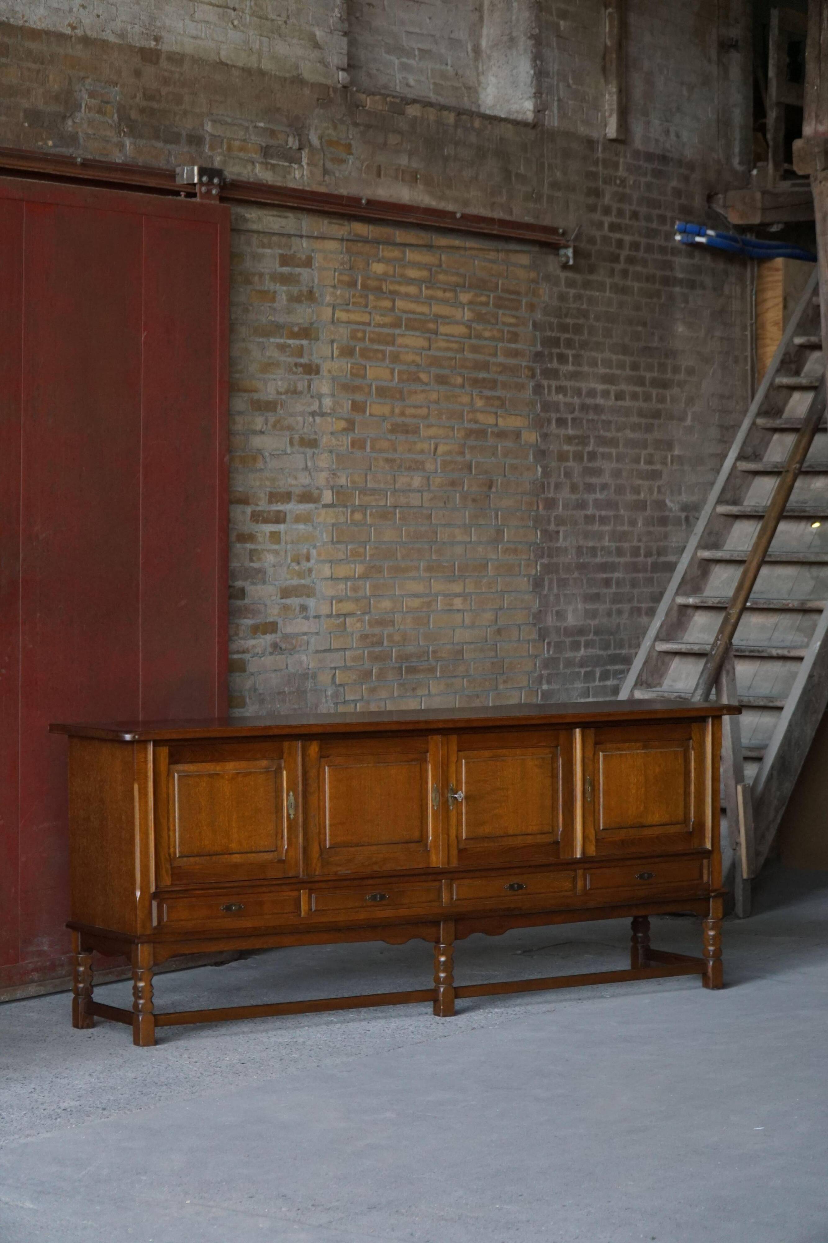 Danish enfilade from the mid-modern century in dark stained oak, 1960s.