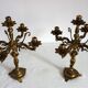 Pair of cherub candle holders in gilded bronze, early 20th century.