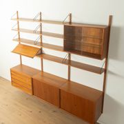 Classic shelving system from the 1960s in teak veneer by Poul Cadovius for Cado