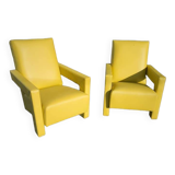 Paire de fauteuils en cuir jaune soleil