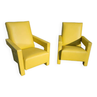 Paire de fauteuils en cuir jaune soleil