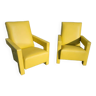 Paire de fauteuils en cuir jaune soleil