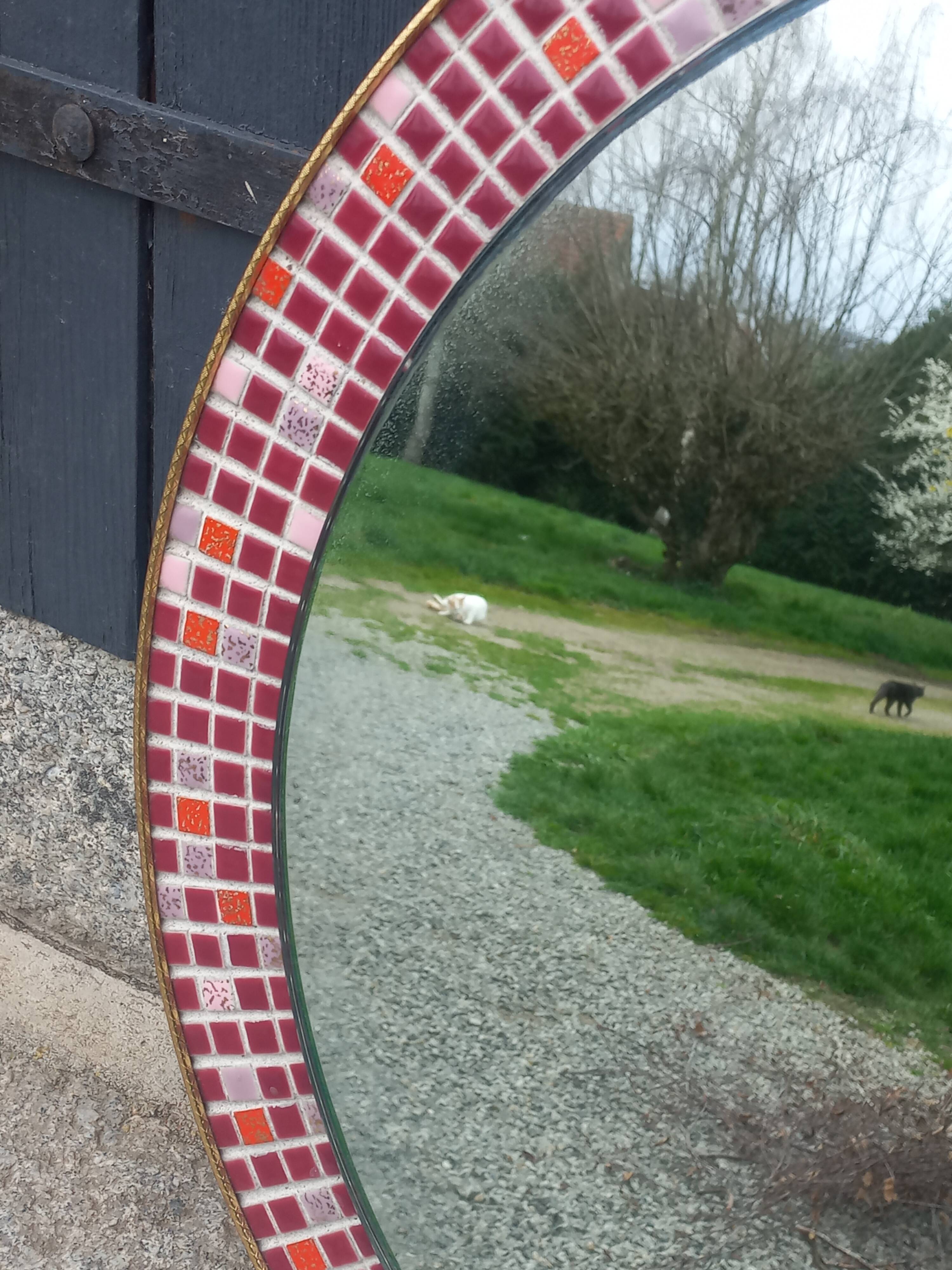 Vintage ceramic mirror from the 1960s.