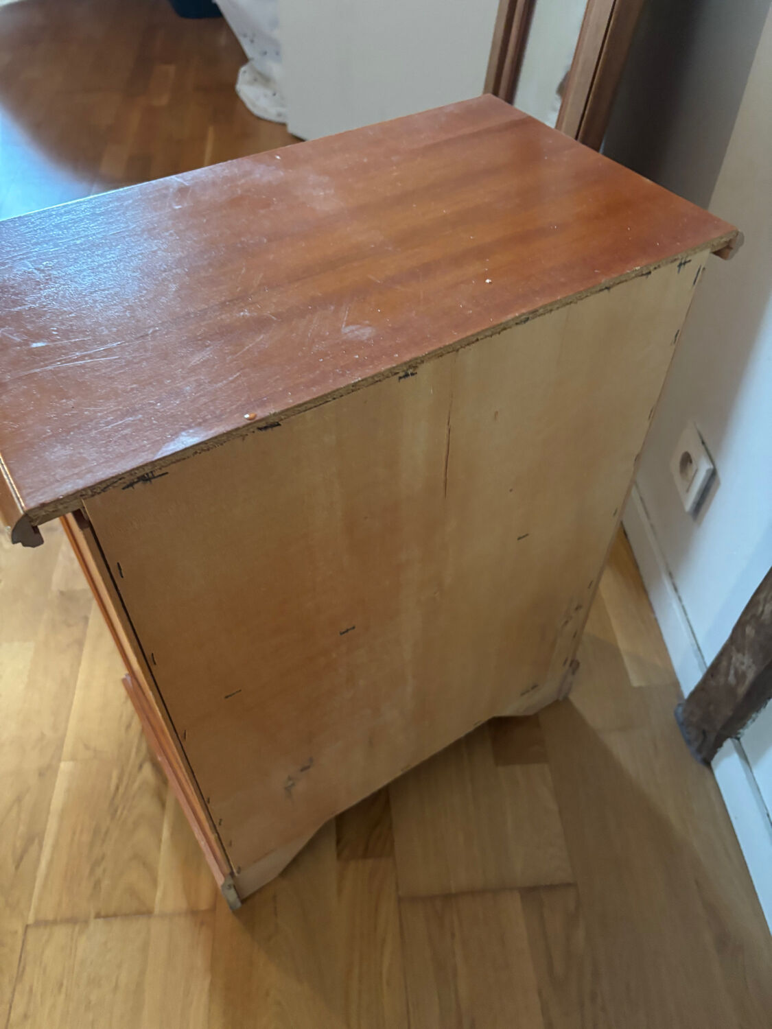 Vintage bedside table with floral decor