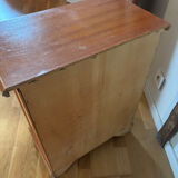 Vintage bedside table with floral decor