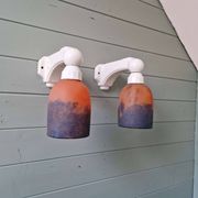 Pair of Art Deco wall sconces in multicoloured porcelain and frosted glass.