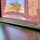 Metal frame in gold colored brass