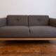 Tikamoon Bjorn sofa in solid oak and brown fabric, 2-seater.