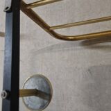 Wall-mounted coat racks in black and gold lacquered metal, circa 1950-1960