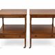 Pair of English mahogany side tables with sliding shelf.