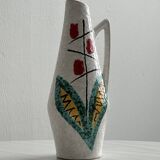 Ceramic pitcher with hand painted floral pattern