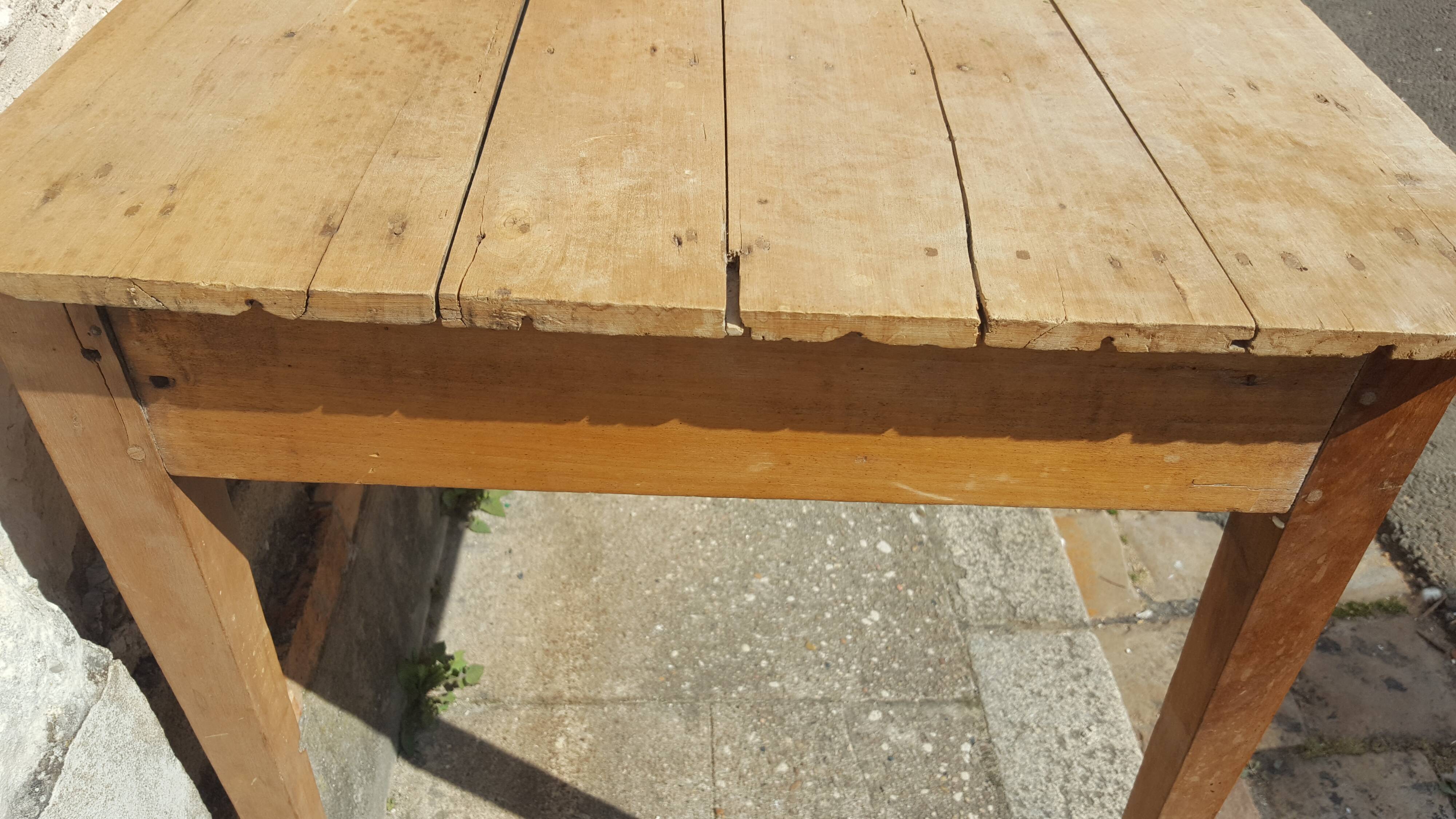 Raw wood farm table with drawer