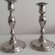 Pair of silver-plated metal candlesticks