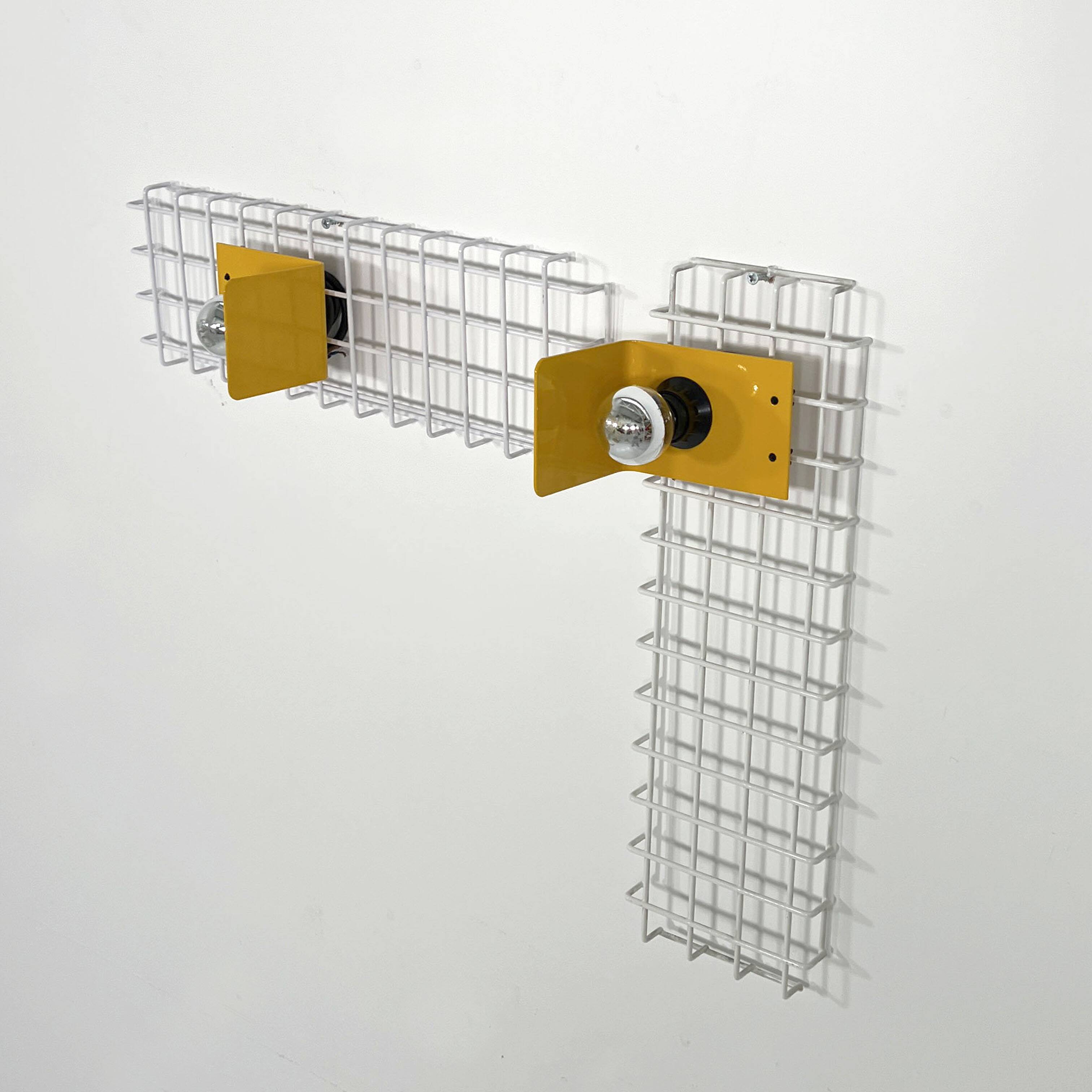 Pair of yellow wall sconces on wire mesh by Seccose, 1980