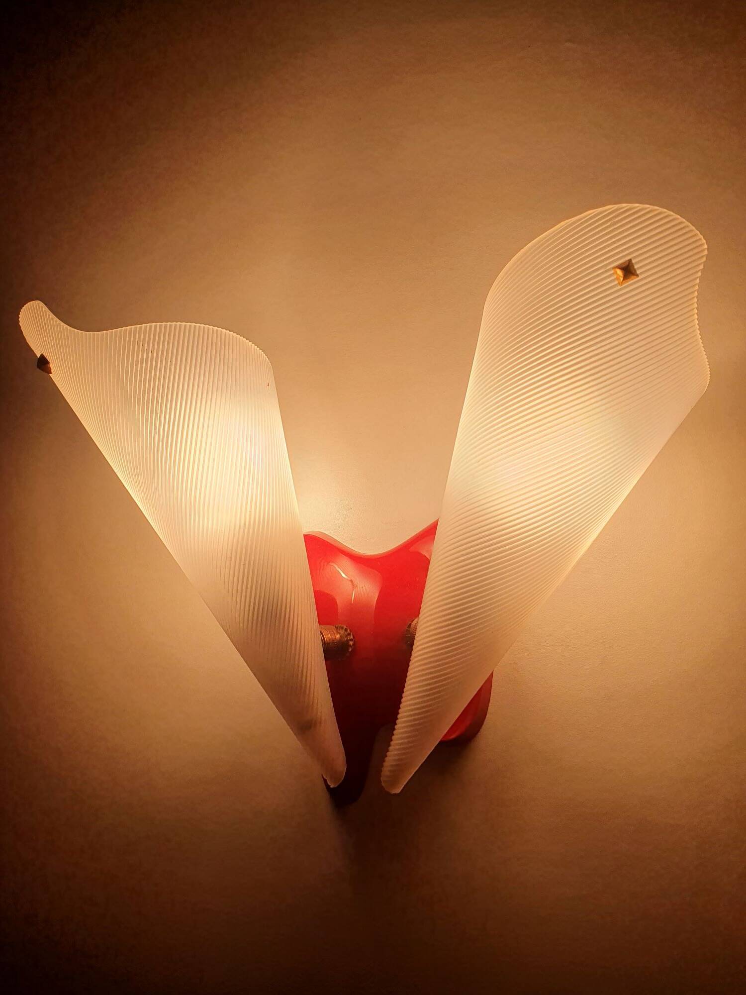 Three vintage rockabilly red plastic wall lights