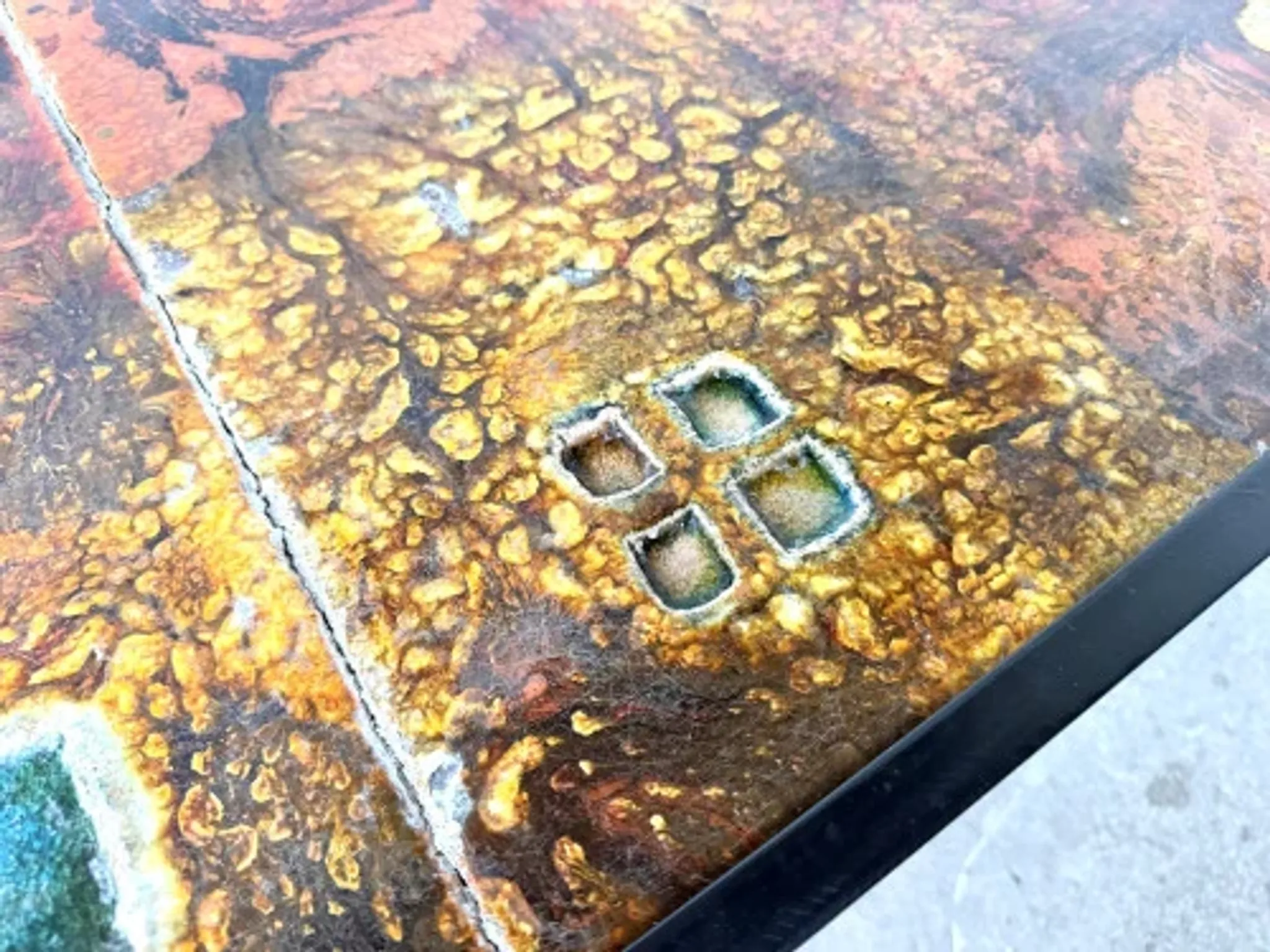 Coffee table by Robert and Jean Cloutier in enamelled lava and metal, 1950s.
