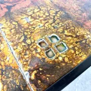 Coffee table by Robert and Jean Cloutier in enamelled lava and metal, 1950s.