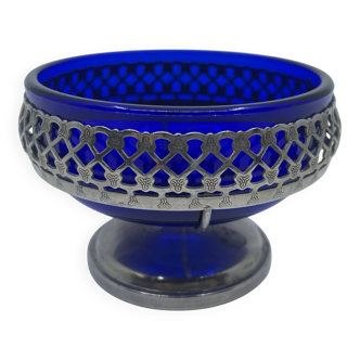 Metal footed bowl with silver plating and cobalt blue glass interior.