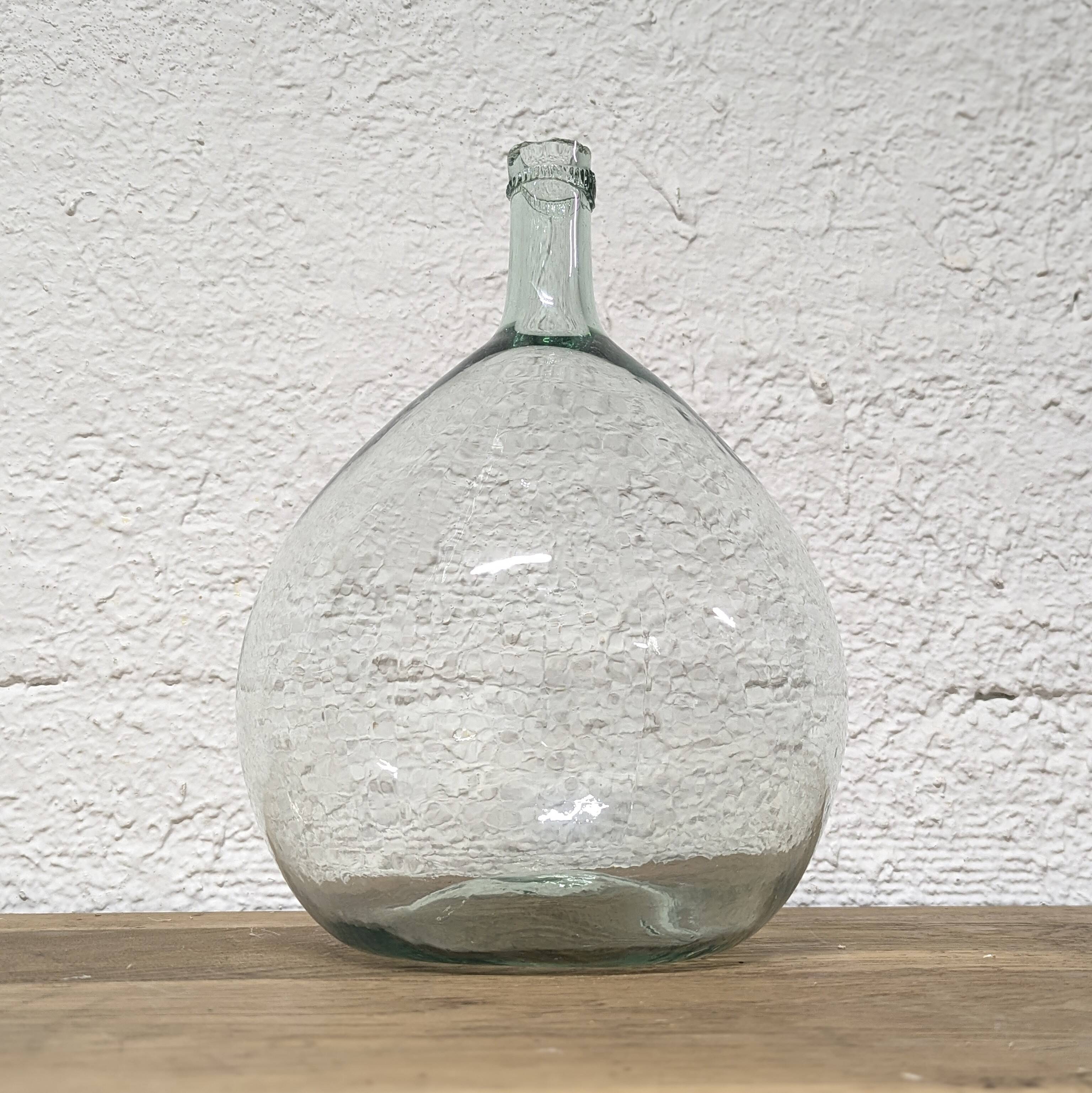 Transparent demijohn in blown glass