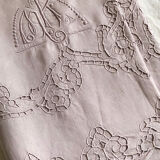 Old embroidered towel tinted purple aurora