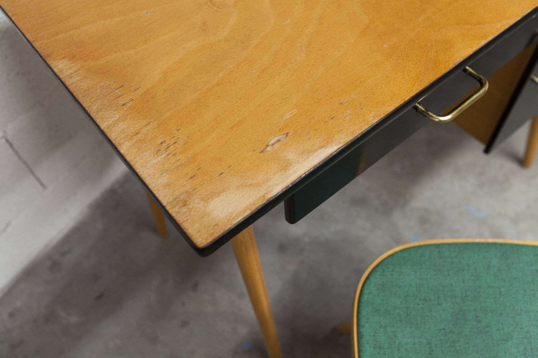 Baumann desk and chair, 1960s, Formica, wood and black, green seat