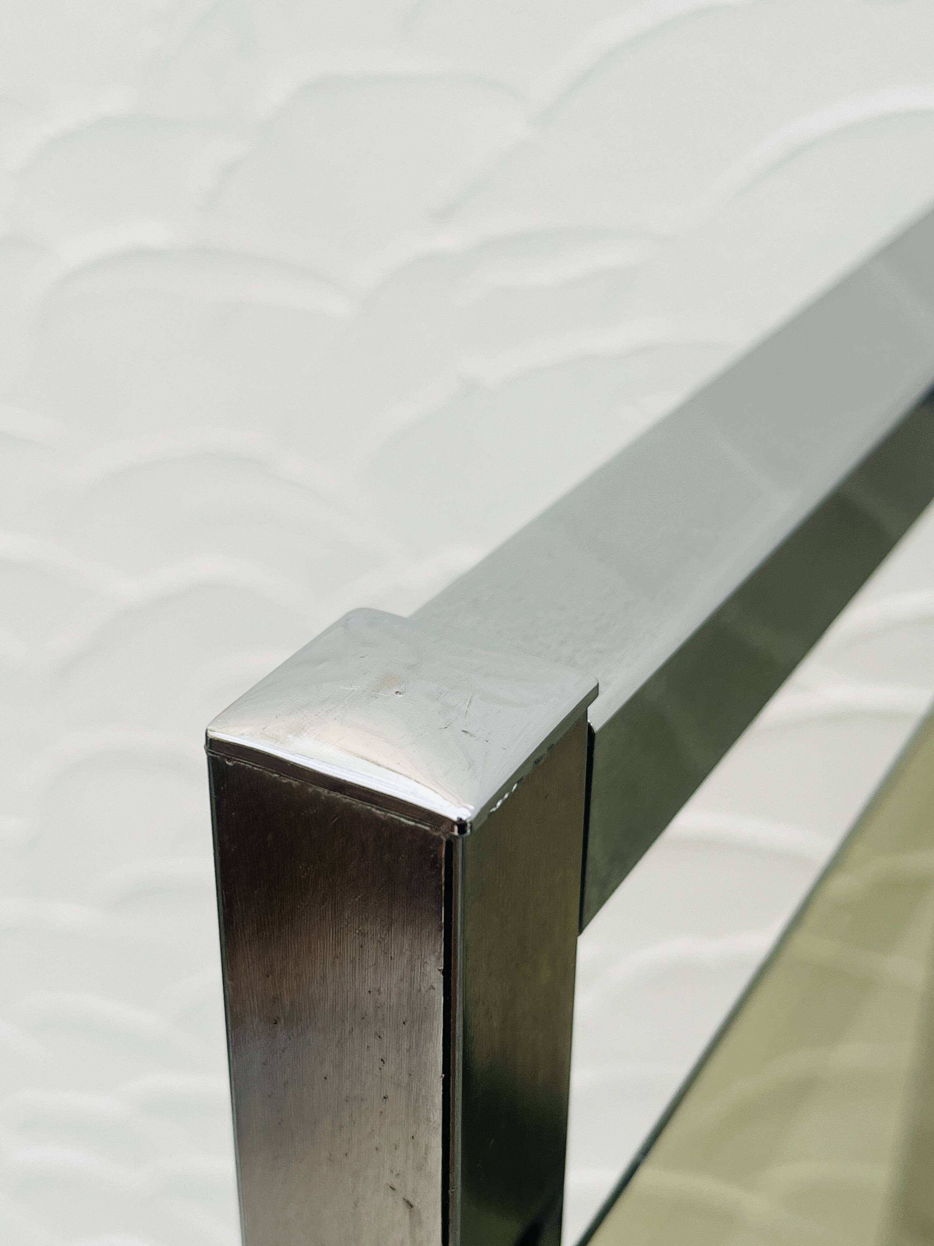 Vintage Italian design shelf in chrome and smoked glass from the 1970s.